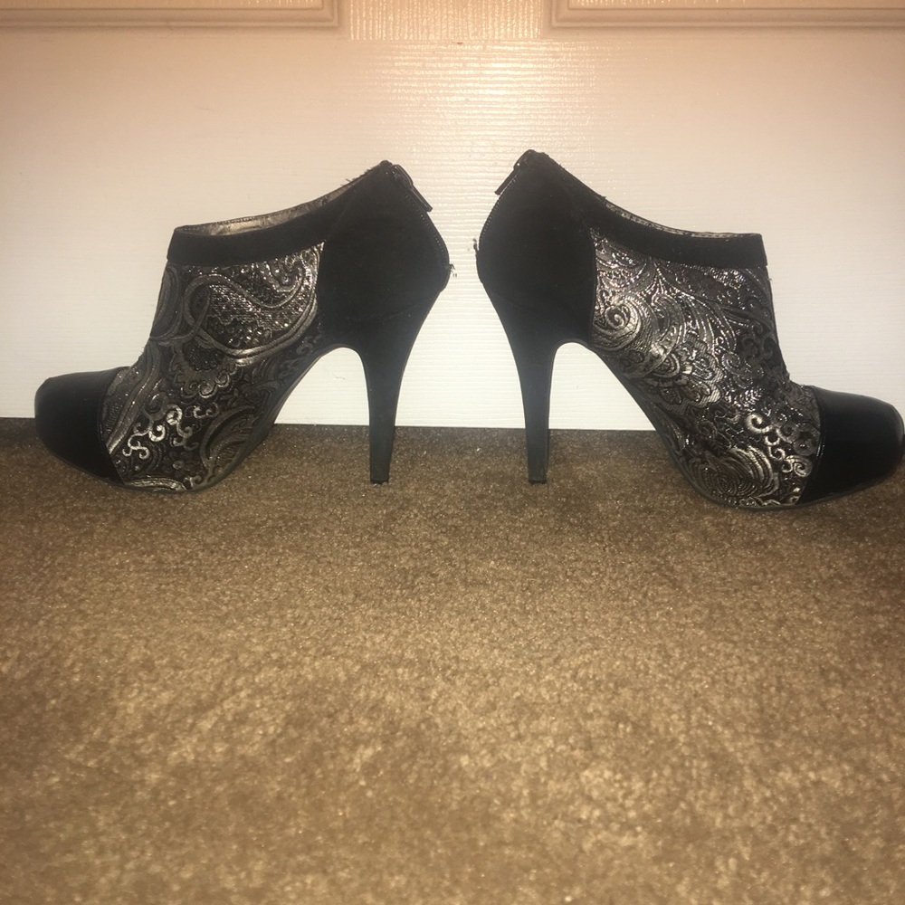 Black & silver booties. Worn a few times. Zipper